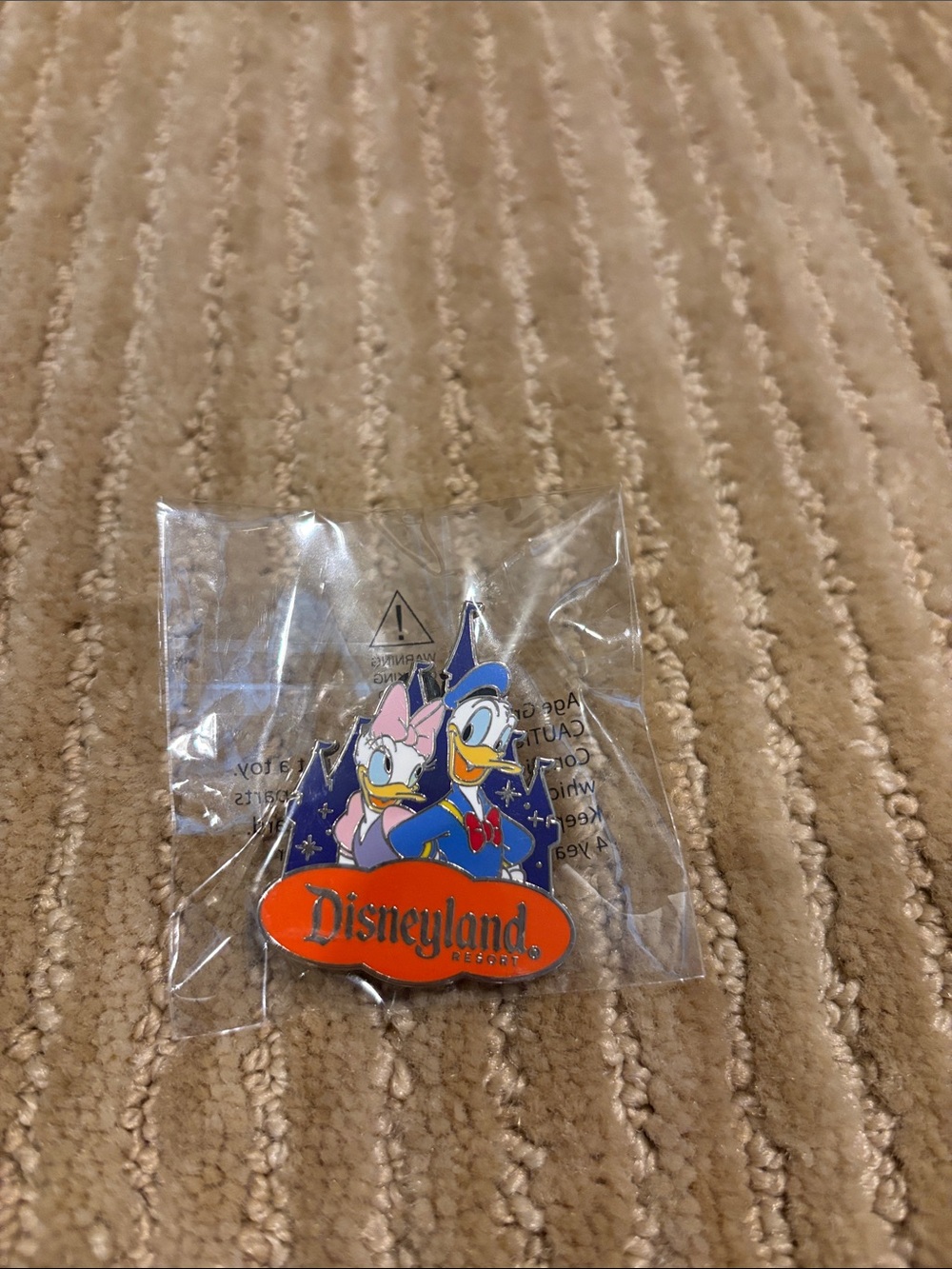 Disneyland Daisy & Donald Enamel Pin in Blue and Orange